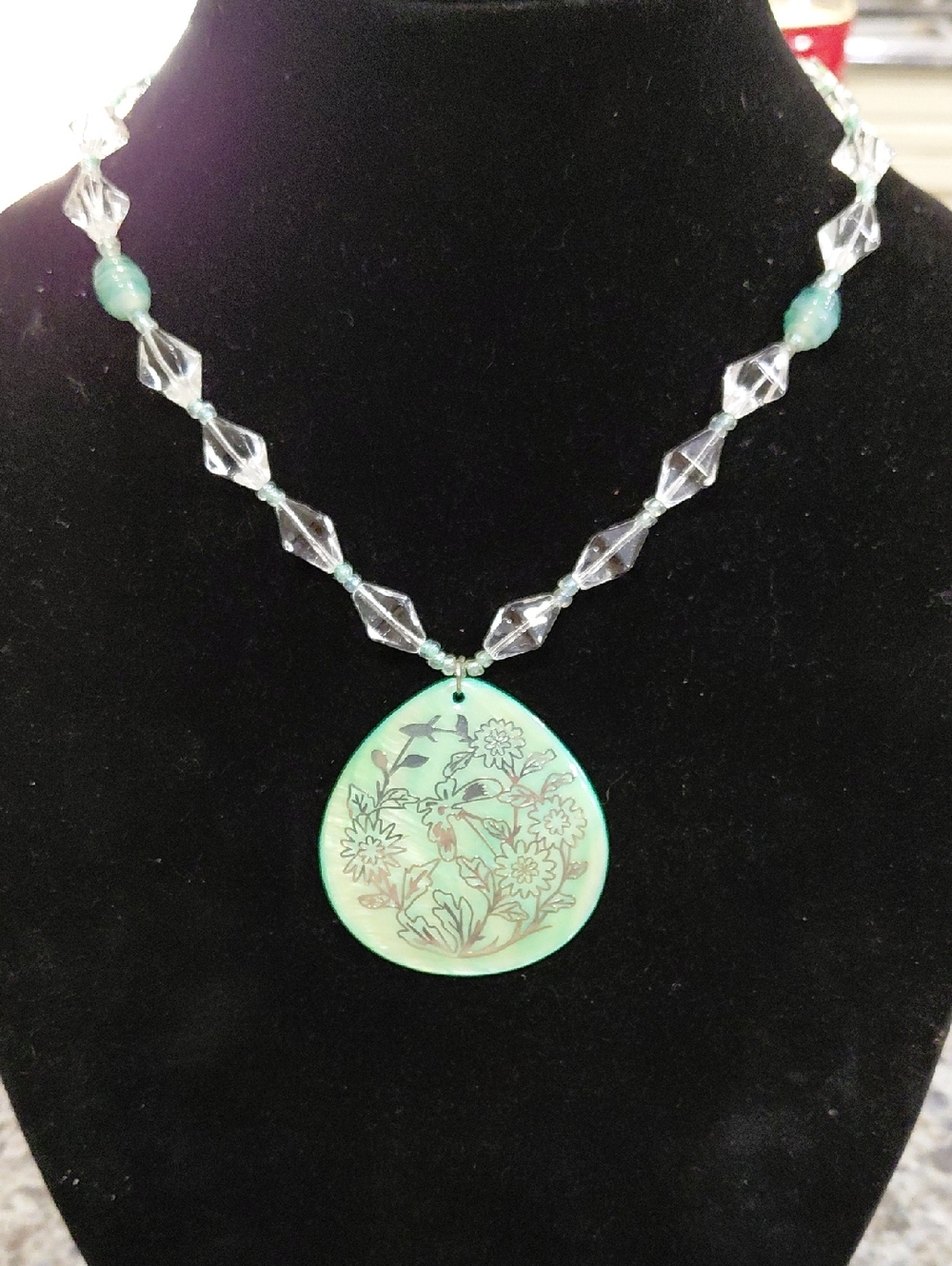 Green Floral Mother of Pearl Teardrop Pendant Necklace with Clear Beaded Chain.